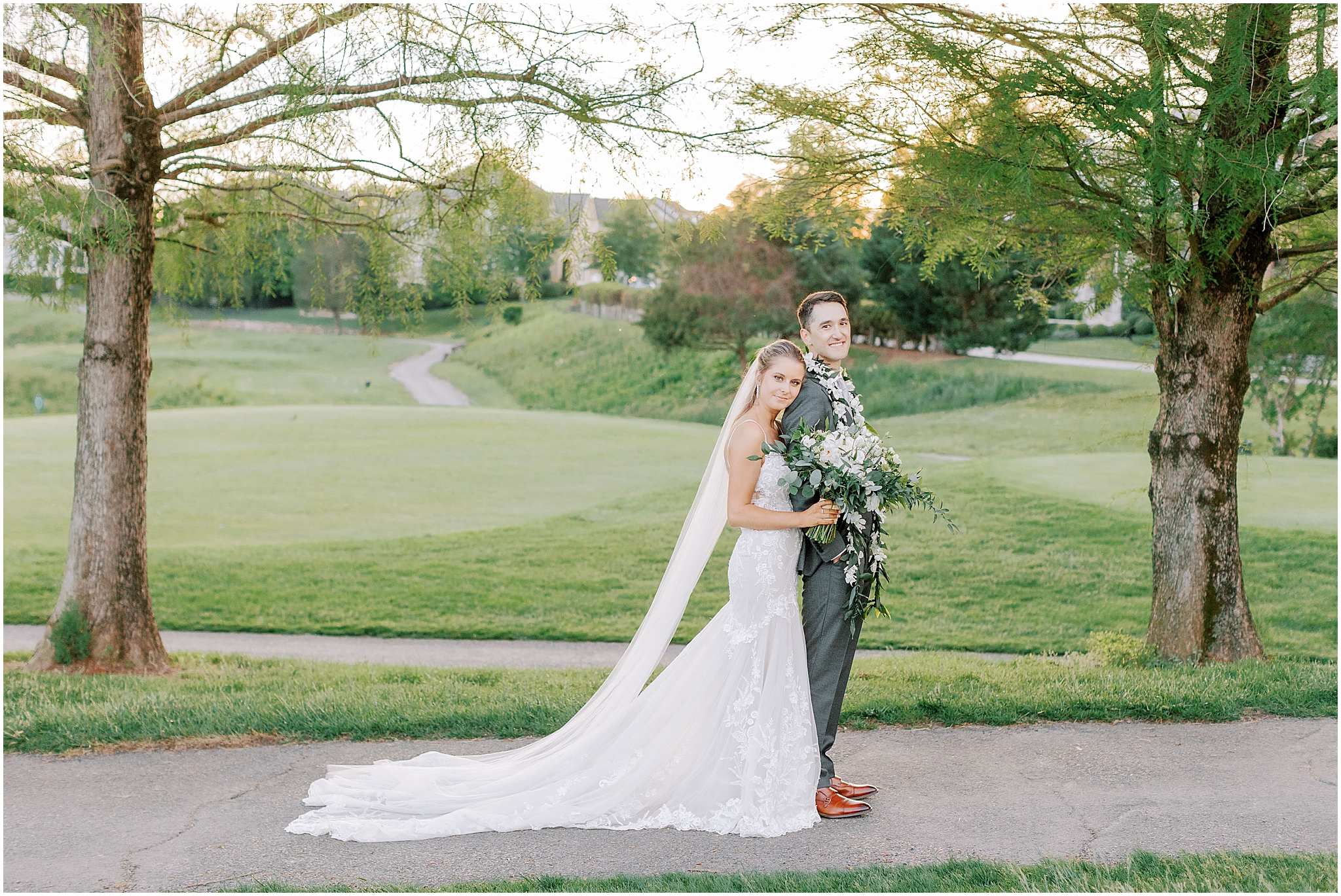bride and groom take romantic photos around Stonewall Golf Club