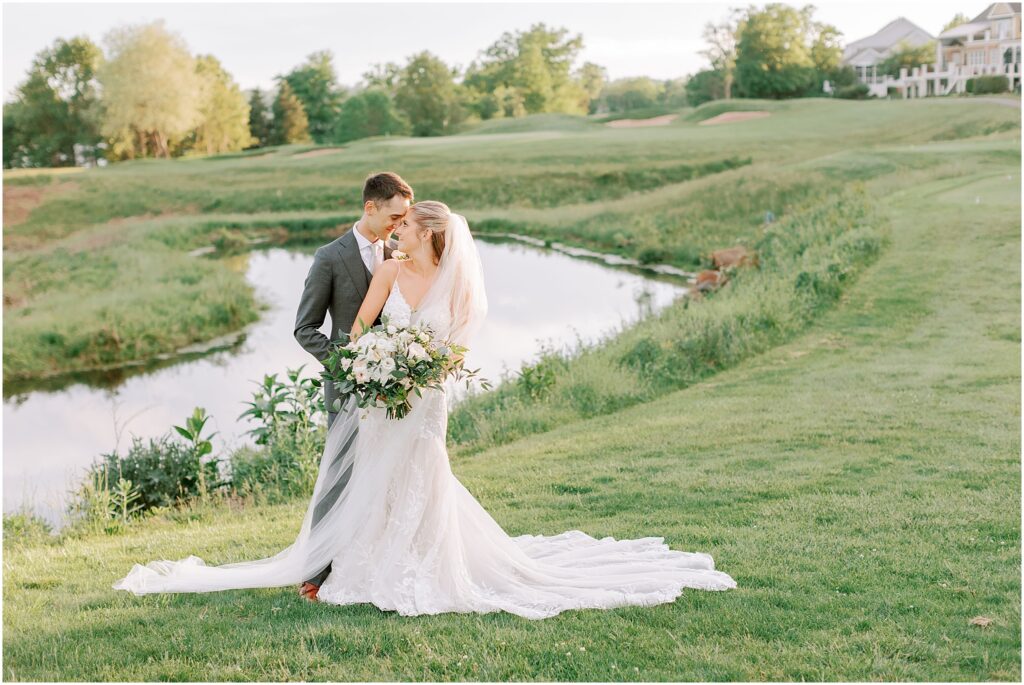 romantic wedding photos of couple on golf green at Stonewall Golf Club